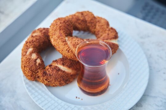 Traditional Turkish breakfast. National food, Turkish tea and semite bun.