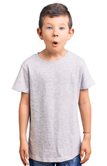 Cute blond kid wearing casual clothes scared and amazed with open mouth for surprise, disbelief face