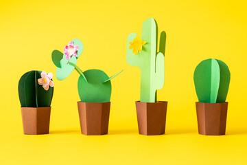 Cinco de Mayo concept - paper craft cactus on solid color background