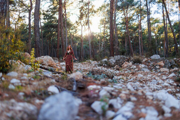 young and beautiful dancer practicing intently among natural landscapes. A young and beautiful girl...