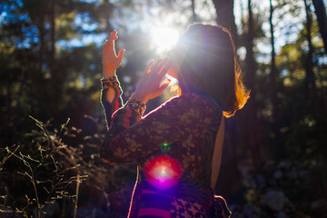 girl alone with nature. young and beautiful girl among natural landscapes.
