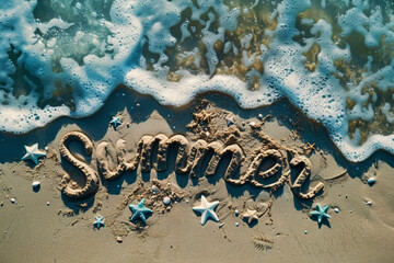 Summer written in the sand on a tropical beach