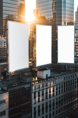 Obraz premium Aerial view of multiple giant blank billboards in a busy city 