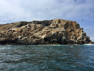 Rocky coast of Palomino Islands in Peru