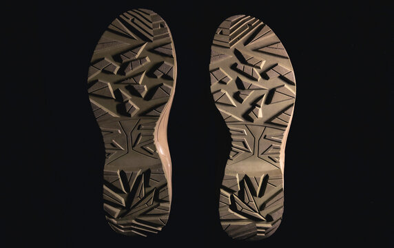Bottom of shoes, isolated on black background.