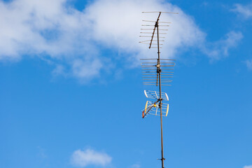 These antennas are commonly seen on residential buildings, providing access to TV signals. They dot...