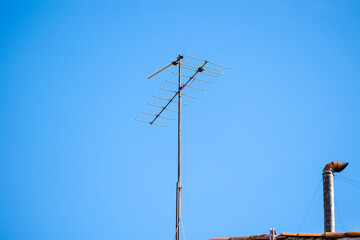 These antennas are commonly seen on residential buildings, providing access to TV signals. They dot...