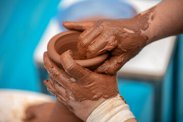 The ceramic paste obtained from this mixture of red soil and silt was handcrafted by artists from...