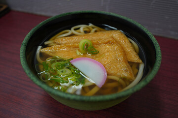 Japanese-style udon with large pieces of tofu