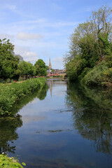Fototapeta na wymiar Chichester canal with a view of the cathedral in the distance