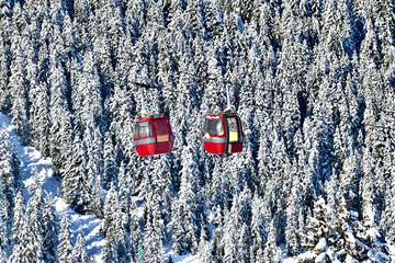 Ski lifts over the slopes of Courchevel ski resort
