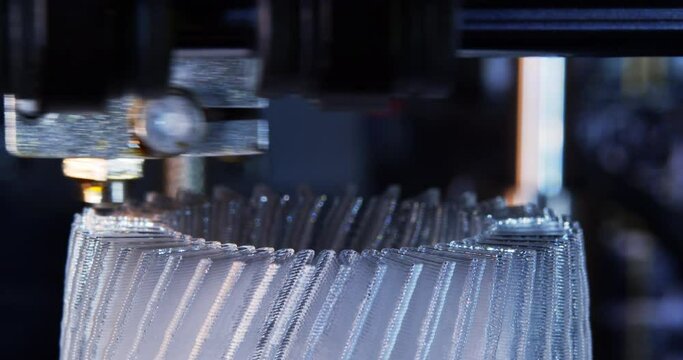 3D printer working. Fused deposition modeling, FDM. 3D printer printing an object from plastic. Automatic three dimensional 3d printer performs plastic. Progressive additive technology for 3d printing