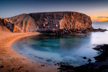 The most beautiful beach on the island of Lanzarote.  Landscape with Papagayo beach after sunset, Lanzarote, Canary Islands, Spain