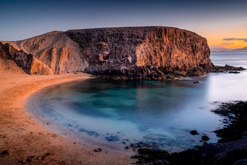 Papier Peint photo Lavable les îles Canaries The most beautiful beach on the island of Lanzarote.  Landscape with Papagayo beach after sunset, Lanzarote, Canary Islands, Spain
