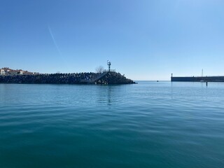 Obraz premium Lighthouse in the sea and blue sky beautiful landscape Sochi, Russia 