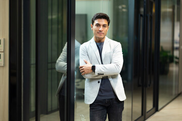 Fototapeta premium Portrait of happy business man. Hispanic latin male. Portrait of handsome caucasian man in formal suit looking at camera smiling