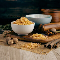 CYPRUS PYRAMID SALT on wooden table background. Herbs, spices and dried food baking ingredient. Mortar and different spices. Cottage kitchen. Product Photography