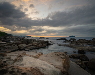 Fototapeta na wymiar Sunset time in the coastline, in Badouzi, Keelung City, Taiwan.