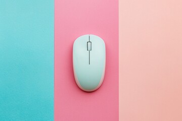 a white computer mouse on a pink and blue background