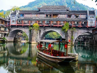 Papier Peint photo Ponte Vecchio Boat moored in the Tuanjiang River