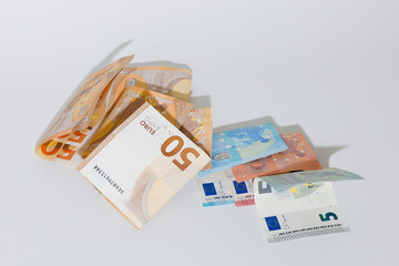 Folded small bills on the floor