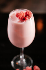 summer cocktail with cream and raspberries