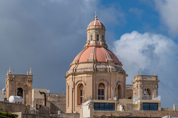 The dome of St. Nicholas Church stands above the rooftops of the historic center of Valletta, Malta
