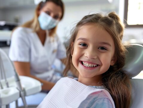 Happy girl at dentist.