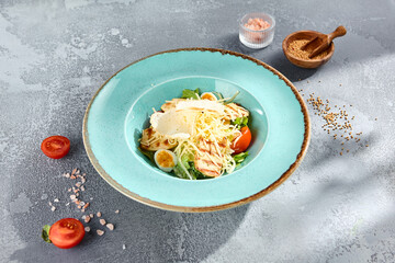 Gourmet Caesar salad with grilled chicken on a textured backdrop with natural sunlight