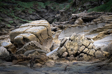 Fototapeta na wymiar Amazing giant stones nearby the coastline, erosion by the sea and wind, become such a beautiful texture, shoot in long lens, in Keelung city, Taiwan.