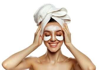 Skincare. Very happy young woman laughing, applying cosmetic eye patches mask, reduces wrinkles, wears wrapped towel on head, isolated on white background. Facial treatment, beauty and spa concept.