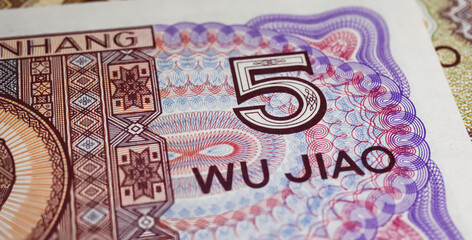 Closeup of 5 Wu Jiao chinese Renminbi currency banknote from 80s (focus on center)