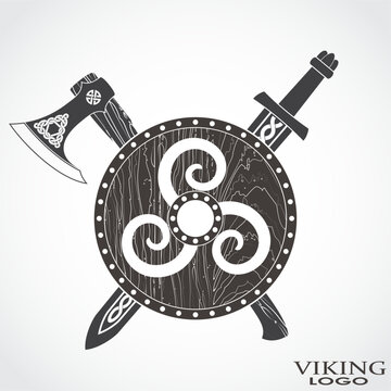 viking shield with sword and axe heraldry symbol