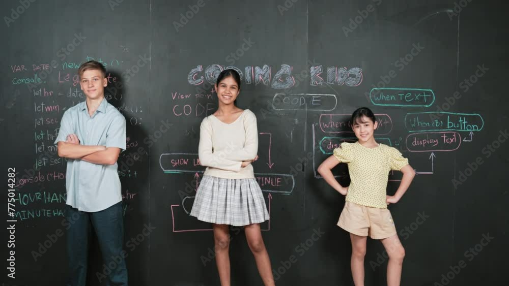 Poster happy student with mixed races writing engineering code blackboard and turn around to pose at camera