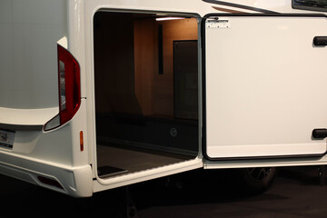 The back door of the camper's trunk. Motorhome. caravan. House on wheels