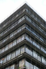 Vertical low angle shot of an angular modern building in Paris, France