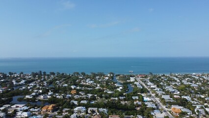 Aerial view of Anna Maria Island on Florida's Gulf Coast in blue sky background