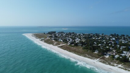 Aerial view of Anna Maria Island on Florida's Gulf Coast in blue sky background