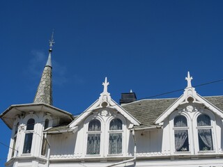 Exterior of beautiful buildings with windows and balconies on a sunny day in Norway, Scandinavia