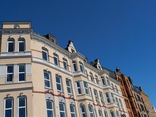 Exterior of beautiful buildings with windows and balconies on a sunny day in Norway, Scandinavia