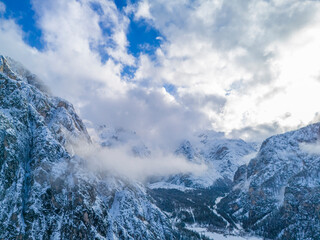italian alps dolomites and surrounding characteristic mountains clouds fog castle church - obrazy, fototapety, plakaty