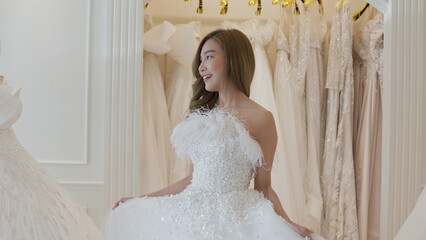 Beautiful bride, young asian woman wearing happy wedding dress and getting ready for wedding, wedding concept