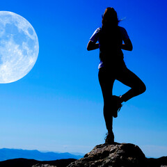 Girl on Mountain Top Silhouette Yoga Pose Health and Mental Wellness with Full Moon