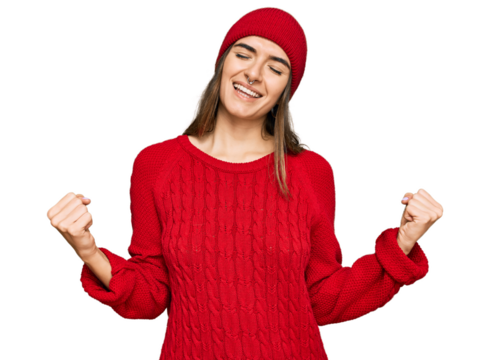 Young hispanic woman wearing casual clothes very happy and excited doing winner gesture with arms raised, smiling and screaming for success. celebration concept.