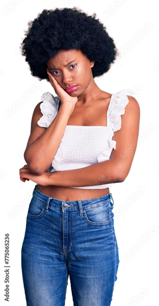 Wall mural Young african american woman wearing casual clothes thinking looking tired and bored with depression problems with crossed arms.