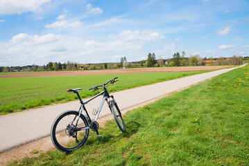 mountain bike trip through rural spring landscape