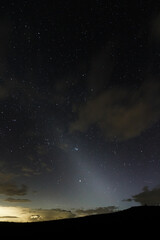 A zodiacal light above the horizon. An intrastellar dust reflection visible from earth.