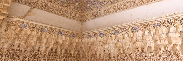 Richly detailed Arabic style wall decorations in the Royal Nazaries Palace in Alhambra, Granada,...