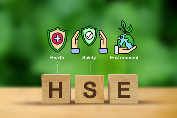 HSE concept ,Health Safety Environment acronym, HSE on a woodblock