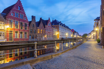 Scenic city view of Bruges canal with beautiful medieval Dutch houses during blue hour, Belgium - obrazy, fototapety, plakaty